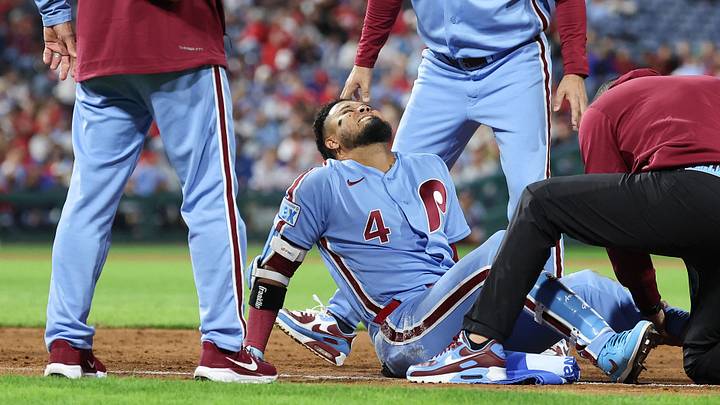 Sep 24, 2026; Philadelphia, Pennsylvania, USA; Philadelphia Phillies second baseman Luis Arraez (4) is checked on by trainer Christian Bermudez and first base coach Paco Figueroa (38) after being injured on a play against the Milwaukee Brewers during the sixth inning at Citizens Bank Park. Mandatory Credit: Bill Streicher-Imagn Images Sep 24, 2026; Philadelphia, Pennsylvania, USA; Philadelphia Phillies second baseman Luis Arraez (4) is checked on by trainer Christian Bermudez and first base coach Paco Figueroa (38) after being injured on a play against the Milwaukee Brewers during the sixth inning at Citizens Bank Park. Mandatory Credit: Bill Streicher-Imagn Images