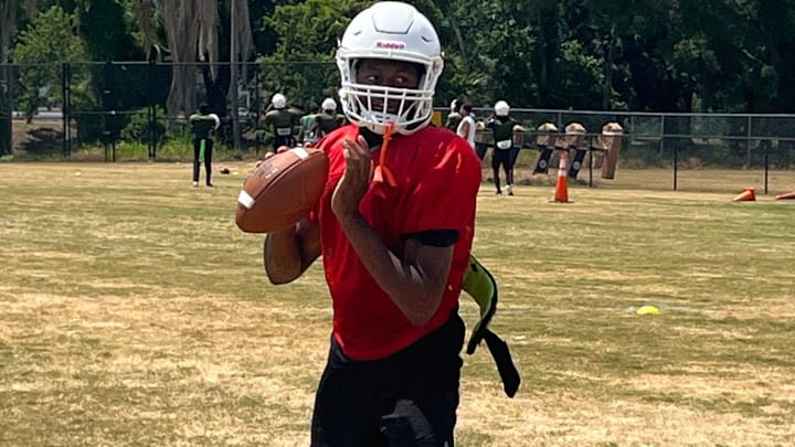 Jones quarterback Dereon Coleman sets up to throw during practice Friday in Orlando. Jones quarterback Dereon Coleman sets up to throw during practice Friday in Orlando.