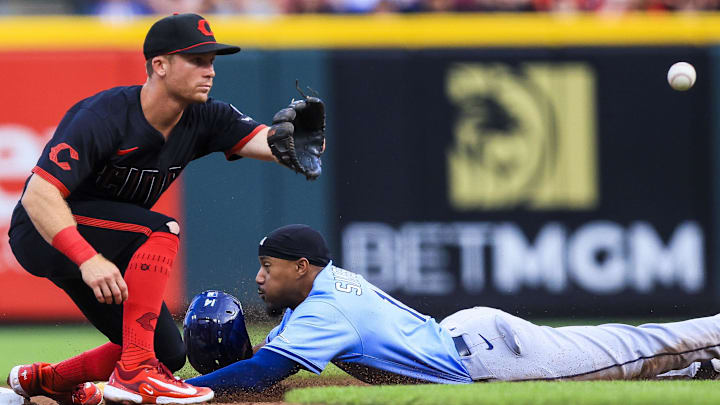 Tampa Bay Rays outfielder Chandler Simpson (14) steals second against Cincinnati Reds second baseman Matt McLain (9) in the third inning at Great American Ball Park. Tampa Bay Rays outfielder Chandler Simpson (14) steals second against Cincinnati Reds second baseman Matt McLain (9) in the third inning at Great American Ball Park.