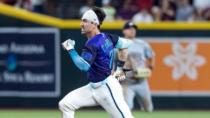 Jun 19, 2026; Phoenix, Arizona, USA; Arizona Diamondbacks outfielder Corbin Carroll runs to third base after hitting a three run triple in the eighth inning against the Minnesota Twins at Chase Field. Mandatory Credit: Mark J. Rebilas-Imagn Images