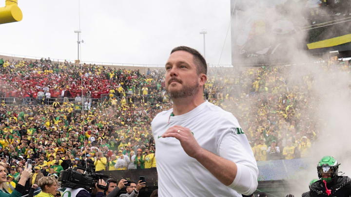 Oregon coach Dan Lanning leads his team onto the field before the game against Indiana at Autzen Stadium October 11, 2025. Oregon coach Dan Lanning leads his team onto the field before the game against Indiana at Autzen Stadium October 11, 2025.