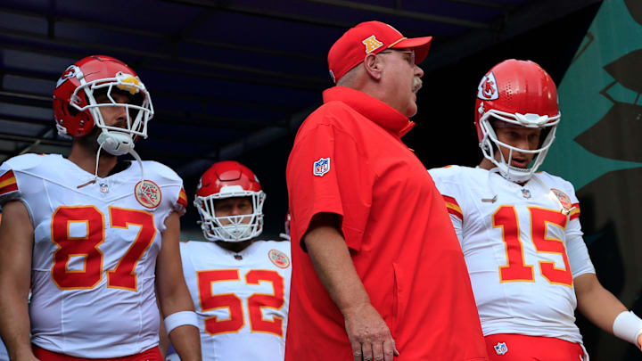 Kansas City Chiefs head coach Andy Reid, center, talks to quarterback Patrick Mahomes (15) next to tight end Travis Kelce (87) before a preseason NFL football game Saturday, Aug. 10, 2024 at EverBank Stadium in Jacksonville, Fla. The Jacksonville Jaguars defeated the Kansas City Chiefs 26-13. [Corey Perrine/Florida Times-Union]