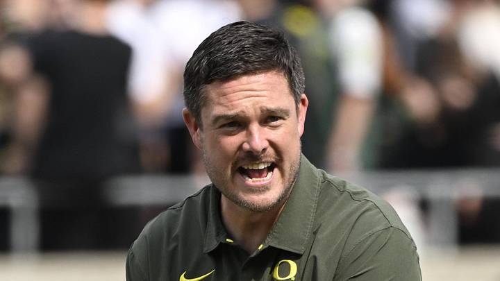 Sep 17, 2022; Eugene, Oregon, USA; Oregon Ducks head coach Dan Lanning encourages his team before a game against the Brigham Young Cougars at Autzen Stadium. Mandatory Credit: Troy Wayrynen-Imagn Images