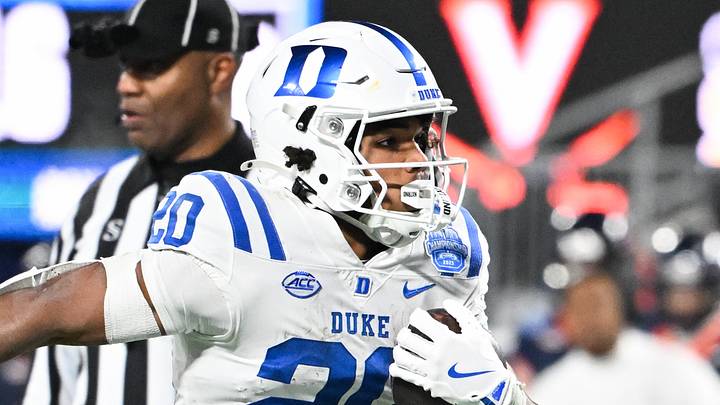 Dec 6, 2025; Charlotte, NC, USA; Duke Blue Devils running back Nate Sheppard (20) runs the ball for a touchdown in the second quarter against the Virginia Cavaliers during the 2025 ACC Championship game at Bank of America Stadium. Mandatory Credit: Bob Donnan-Imagn Images Dec 6, 2025; Charlotte, NC, USA; Duke Blue Devils running back Nate Sheppard (20) runs the ball for a touchdown in the second quarter against the Virginia Cavaliers during the 2025 ACC Championship game at Bank of America Stadium. Mandatory Credit: Bob Donnan-Imagn Images