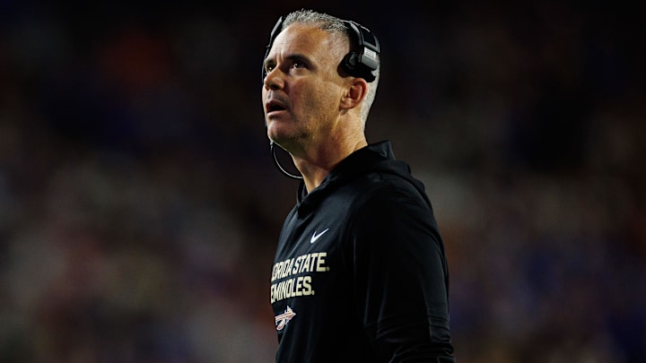 Nov 29, 2025; Gainesville, Florida, USA; Florida State Seminoles head coach Mike Norvell looks on against the Florida Gators during the second half at Ben Hill Griffin Stadium. Mandatory Credit: Matt Pendleton-Imagn Images