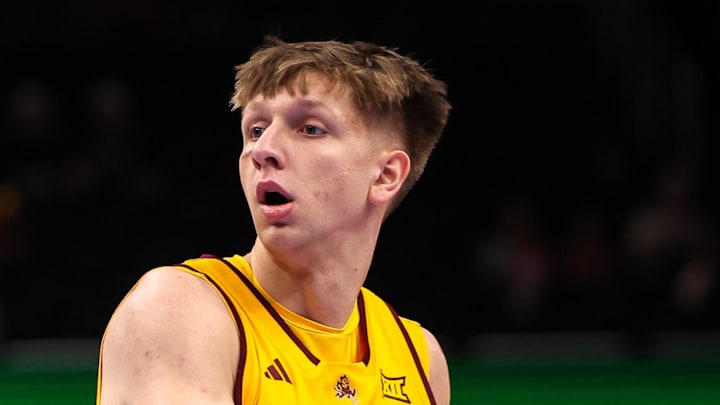 Mar 10, 2026; Kansas City, MO, USA; Arizona State Sun Devils guard Noah Meeusen (15) drives around Baylor Bears guard Obi Agbim (5) during the first half at T-Mobile Center. Mandatory Credit: William Purnell-Imagn Images