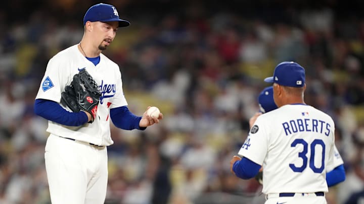 Los Angeles Dodgers starting pitcher Blake Snell (7) is removed by manager Dave Roberts (30) in the sixth inning against the Arizona Diamondbacks at Dodger Stadium on Aug. 29.