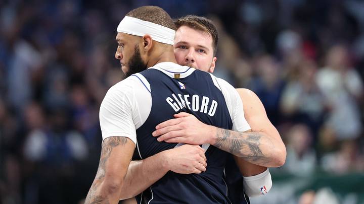 May 28, 2024; Dallas, Texas, USA; Dallas Mavericks guard Luka Doncic (77) hugs center Daniel Gafford (21) during the fourth quarter of game four against the Minnesota Timberwolves in the western conference finals for the 2024 NBA playoffs at American Airlines Center. Mandatory Credit: Kevin Jairaj-Imagn Images May 28, 2024; Dallas, Texas, USA; Dallas Mavericks guard Luka Doncic (77) hugs center Daniel Gafford (21) during the fourth quarter of game four against the Minnesota Timberwolves in the western conference finals for the 2024 NBA playoffs at American Airlines Center. Mandatory Credit: Kevin Jairaj-Imagn Images