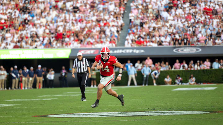 Gunner Stockton Carries for the Bulldogs