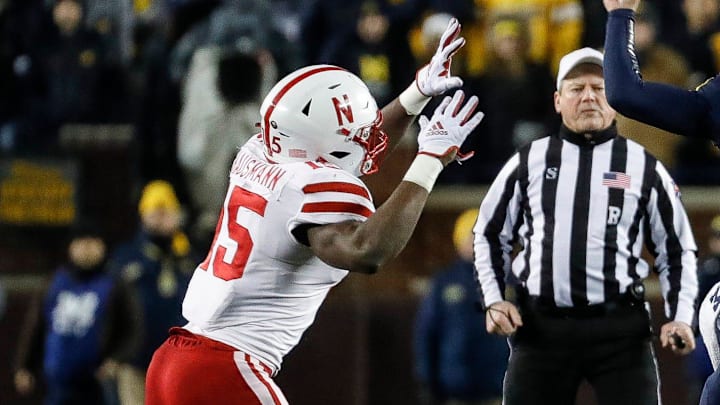 Linebacker Ernest Hausmann rushes the passer during Nebraska's 2022 game at Michigan, the school he would transfer to after the season. Linebacker Ernest Hausmann rushes the passer during Nebraska's 2022 game at Michigan, the school he would transfer to after the season.