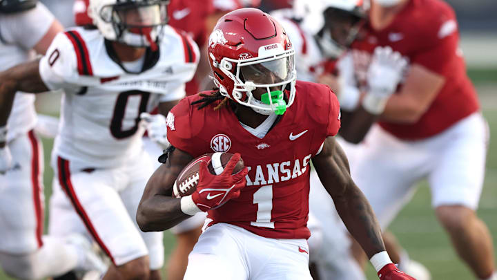 Sep 6, 2025; Little Rock, Arkansas, USA; Arkansas Razorbacks running back Rodney Hill (1) rushes during the fourth quarter against the Arkansas State Red Wolves at War Memorial Stadium. Arkansas won 56-14. Mandatory Credit: Nelson Chenault-Imagn Images