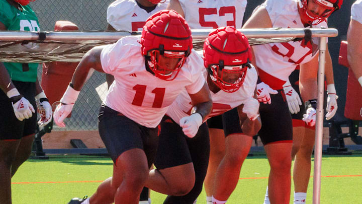 Nebraska defensive linemen Cameron Lenhardt and Elijah Jeudy go through a drill during the first day of fall practice.
