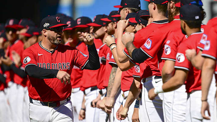 Sep 30, 2025; Cleveland, Ohio, USA; Cleveland Guardians manager Stephen Vogt greets players while being introduced before game one of the Wildcard round for the 2025 MLB playoffs against the Detroit Tigers at Progressive Field. Mandatory Credit: David Dermer-Imagn Images
