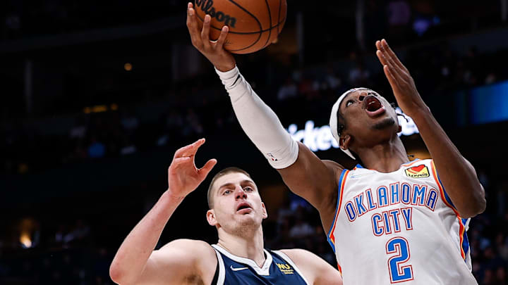 Mar 2, 2022; Denver, Colorado, USA; Oklahoma City Thunder guard Shai Gilgeous-Alexander (2) drives