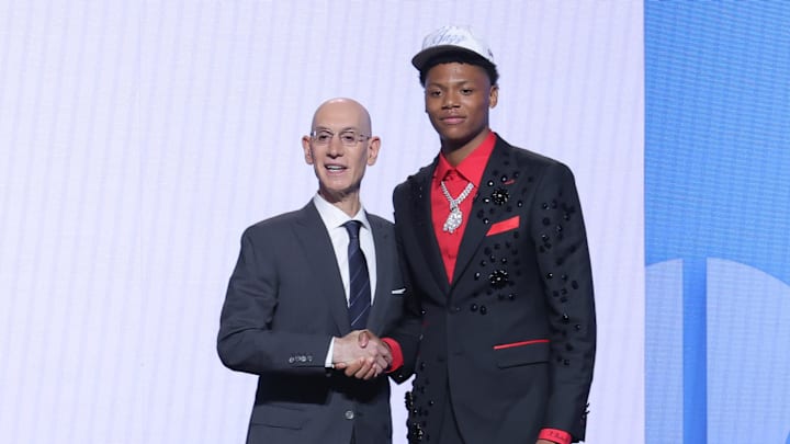 Jun 25, 2025; Brooklyn, NY, USA; Ace Bailey stands with NBA commissioner Adam Silver after being selected as the fifth pick by the Utah Jazz in the first round of the 2025 NBA Draft at Barclays Center. Mandatory Credit: Brad Penner-Imagn Images Jun 25, 2025; Brooklyn, NY, USA; Ace Bailey stands with NBA commissioner Adam Silver after being selected as the fifth pick by the Utah Jazz in the first round of the 2025 NBA Draft at Barclays Center. Mandatory Credit: Brad Penner-Imagn Images