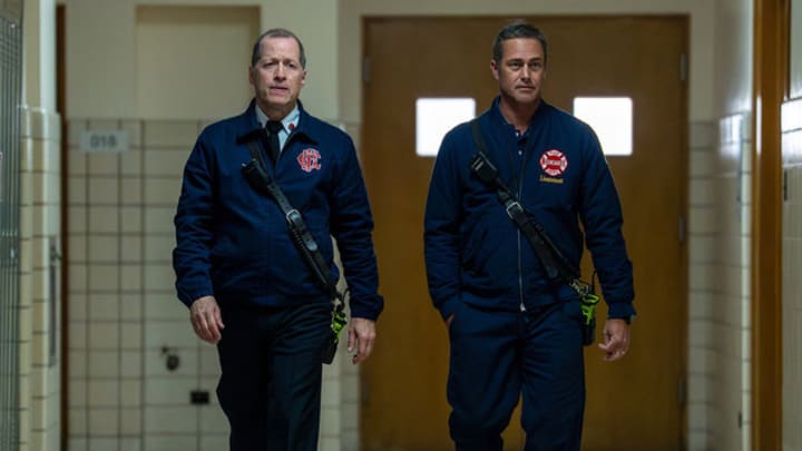 CHICAGO FIRE -- "Pierce The Vein" Episode 1407 -- Pictured: (l-r) Tim Hopper as Tom Van Meter, Taylor Kinney as Kelly Severide 