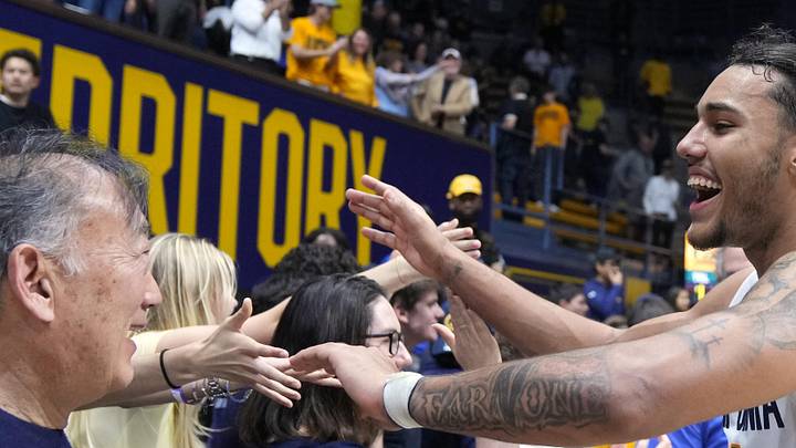 Feb 24, 2024; Berkeley, California, USA; California Golden Bears guard Jaylon Tyson (right) celebrates with fans after defeating the Oregon Ducks at Haas Pavilion. Mandatory Credit: Darren Yamashita-USA TODAY Sports Feb 24, 2024; Berkeley, California, USA; California Golden Bears guard Jaylon Tyson (right) celebrates with fans after defeating the Oregon Ducks at Haas Pavilion. Mandatory Credit: Darren Yamashita-USA TODAY Sports