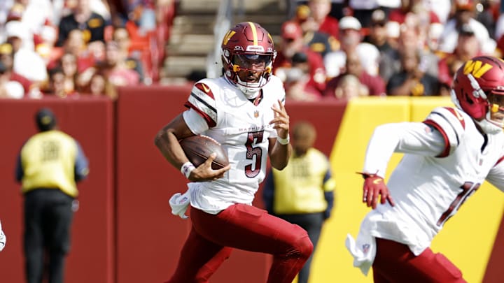 Washington Commanders quarterback Jayden Daniels (5).