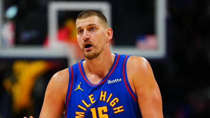 Oct 26, 2026; Denver, Colorado, USA;  Denver Nuggets center Nikola Jokic (15) reacts in the second quarter against the Golden State Warriors at Ball Arena.  Mandatory Credit: Ron Chenoy-Imagn Images