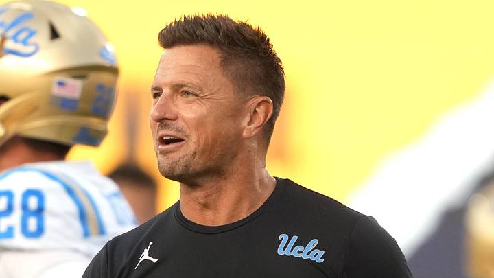Sep 5, 2026; Berkeley, California, USA; UCLA Bruins head coach Bob Chesney (center) talks to UCLA Bruins linebacker Jalen Woods (left) before the game against the California Golden Bears at California Memorial Stadium. Mandatory Credit: Darren Yamashita-Imagn Images Sep 5, 2026; Berkeley, California, USA; UCLA Bruins head coach Bob Chesney (center) talks to UCLA Bruins linebacker Jalen Woods (left) before the game against the California Golden Bears at California Memorial Stadium. Mandatory Credit: Darren Yamashita-Imagn Images