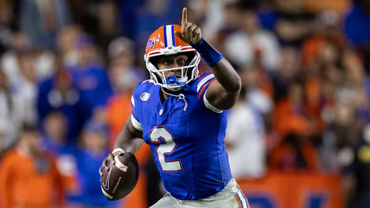Oct 19, 2024; Gainesville, Florida, USA; Florida Gators quarterback DJ Lagway (2) gestures while running with the ball against the Kentucky Wildcats during the second half at Ben Hill Griffin Stadium. Mandatory Credit: Matt Pendleton-Imagn Images