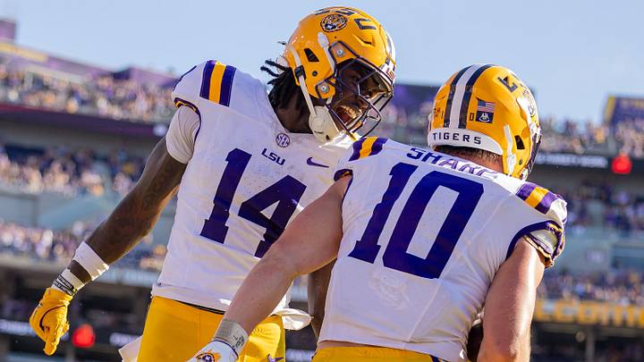 LSU Tigers tight end Trey'Dez Green (14) celebrates a touchdown by tight end Bauer Sharp (10) against the Arkansas Razorbacks during the second half at Tiger Stadium. LSU Tigers tight end Trey'Dez Green (14) celebrates a touchdown by tight end Bauer Sharp (10) against the Arkansas Razorbacks during the second half at Tiger Stadium.