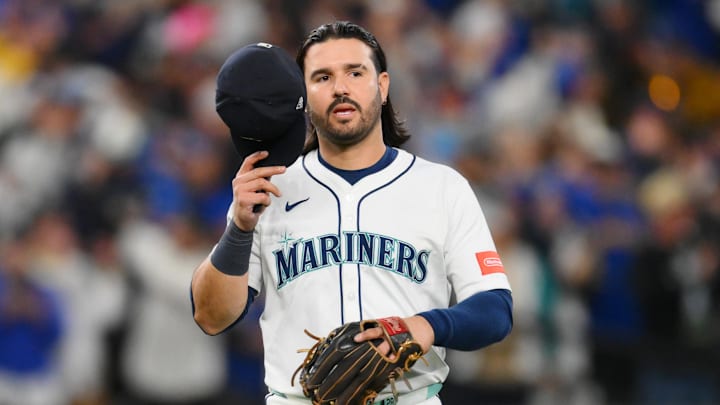 Oct 17, 2025; Seattle, Washington, USA; Seattle Mariners third baseman Eugenio Suarez (28) reacts after their win against the Toronto Blue Jays in game five of the ALCS round for the 2025 MLB playoffs at T-Mobile Park. Mandatory Credit: Steven Bisig-Imagn Images