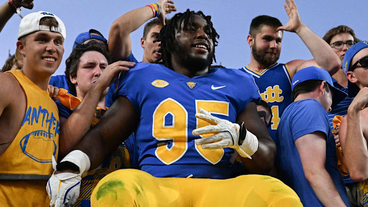 Sep 14, 2024; Pittsburgh, Pennsylvania, USA; Pittsburgh Panthers defensive lineman Francis Brewu (95) celebrates after defeating the West Virginia Mountaineers at Acrisure Stadium. Mandatory Credit: Barry Reeger-Image Images