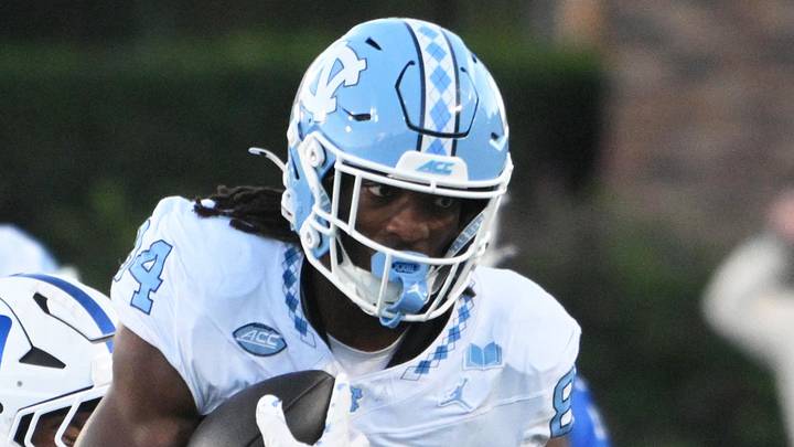 Oct 17, 2026; Durham, North Carolina, USA; North Carolina Tar Heels tight end Shamar Easter (84) runs the ball during the third quarter against Duke Blue Devils linebacker Bradley Gompers (24) and Duke Blue Devils saftey Patrick Smith-Young (2) at Wallace Wade Stadium. Mandatory Credit: Zachary Taft-Imagn Images Oct 17, 2026; Durham, North Carolina, USA; North Carolina Tar Heels tight end Shamar Easter (84) runs the ball during the third quarter against Duke Blue Devils linebacker Bradley Gompers (24) and Duke Blue Devils saftey Patrick Smith-Young (2) at Wallace Wade Stadium. Mandatory Credit: Zachary Taft-Imagn Images