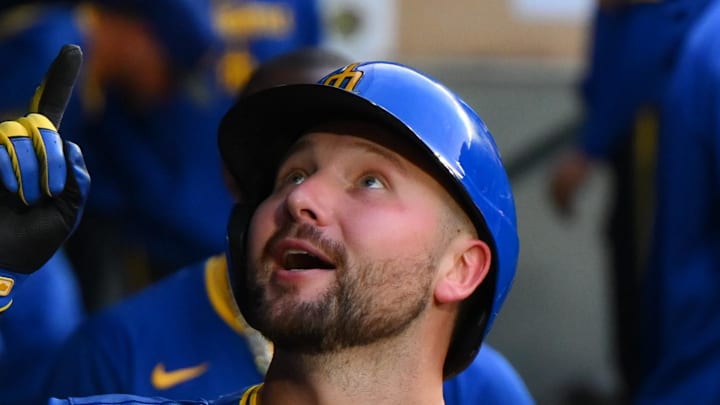 Seattle Mariners catcher Cal Raleigh (29) celebrates in the dugout after hitting a home run against the Texas Rangers during the fifth inning at T-Mobile Park on July 31. 
