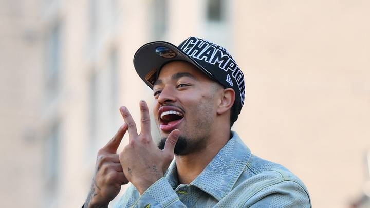 Seattle Seahawks wide receiver Jaxon Smith-Njigba interacts with fans