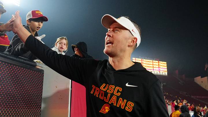 Southern California Trojans head coach Lincoln Riley celebrates with fans after the game against the UCLA Bruins at United Airlines Field at Los Angeles Memorial Coliseum. Southern California Trojans head coach Lincoln Riley celebrates with fans after the game against the UCLA Bruins at United Airlines Field at Los Angeles Memorial Coliseum.