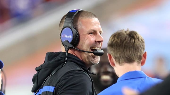 Dec 20, 2024; Tampa, FL, USA; Florida Gators head coach Billy Napier smiles against the Tulane Green Wave during the second half at Raymond James Stadium. Mandatory Credit: Kim Klement Neitzel-Imagn Images