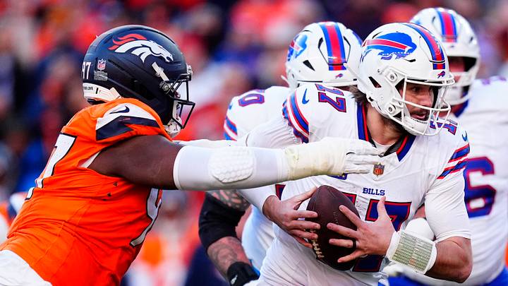 Jan 17, 2026; Denver, CO, USA; Denver Broncos defensive tackle Malcolm Roach (97) tackles Buffalo Bills quarterback Josh Allen (17) during the second quarter of an AFC Divisional Round playoff game at Empower Field at Mile High. Mandatory Credit: Ron Chenoy-Imagn Images Jan 17, 2026; Denver, CO, USA; Denver Broncos defensive tackle Malcolm Roach (97) tackles Buffalo Bills quarterback Josh Allen (17) during the second quarter of an AFC Divisional Round playoff game at Empower Field at Mile High. Mandatory Credit: Ron Chenoy-Imagn Images