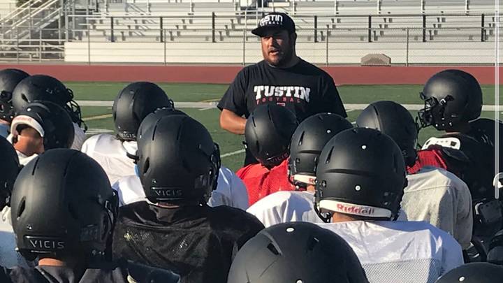Tustin head coach Tony Lopez addresses his team during practice. Lopez, a 2006 Damien graduate, returns to his alma mater Thursday as the Tillers face the Spartans. Tustin head coach Tony Lopez addresses his team during practice. Lopez, a 2006 Damien graduate, returns to his alma mater Thursday as the Tillers face the Spartans.
