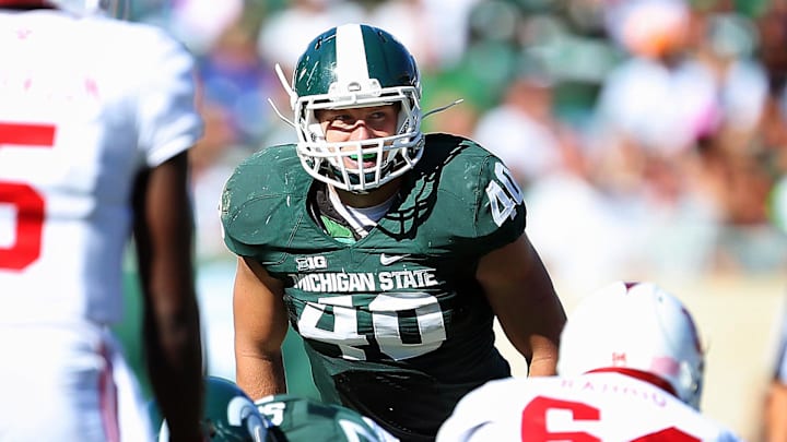 Oct 12, 2013; East Lansing, MI, USA; Michigan State Spartans linebacker Max Bullough (40) looks over Indiana Hoosiers offense during the second half in a game at Spartan Stadium. MSU won 42-28. Mandatory Credit: Mike Carter-Imagn Images Oct 12, 2013; East Lansing, MI, USA; Michigan State Spartans linebacker Max Bullough (40) looks over Indiana Hoosiers offense during the second half in a game at Spartan Stadium. MSU won 42-28. Mandatory Credit: Mike Carter-Imagn Images
