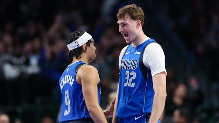 Dec 3, 2025; Dallas, Texas, USA; Dallas Mavericks forward Cooper Flagg (32) celebrates with Dallas Mavericks guard Ryan Nembhard (9) after scoring during the fourth quarter against the Miami Heat at American Airlines Center. Mandatory Credit: Kevin Jairaj-Imagn Images Dec 3, 2025; Dallas, Texas, USA; Dallas Mavericks forward Cooper Flagg (32) celebrates with Dallas Mavericks guard Ryan Nembhard (9) after scoring during the fourth quarter against the Miami Heat at American Airlines Center. Mandatory Credit: Kevin Jairaj-Imagn Images