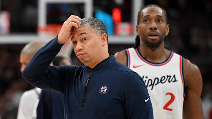 Feb 2, 2025; Toronto, Ontario, CAN; LA Clippers coach Tyronn Lue scratches his head after calling a timeout as forward Kawhi Leonard (2) walks past in the first half against the Toronto Raptors at Scotiabank Arena. Feb 2, 2025; Toronto, Ontario, CAN; LA Clippers coach Tyronn Lue scratches his head after calling a timeout as forward Kawhi Leonard (2) walks past in the first half against the Toronto Raptors at Scotiabank Arena.