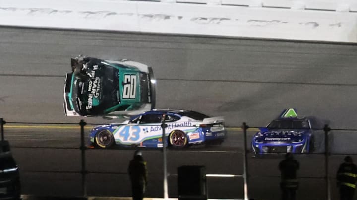 Feb 16, 2025; Daytona Beach, Florida, USA; NASCAR Cup Series driver Ryan Preece (60) gets airborne and crashes alongside Erik Jones (43) and Daniel Suarez (99) during the Daytona 500 at Daytona International Speedway. Feb 16, 2025; Daytona Beach, Florida, USA; NASCAR Cup Series driver Ryan Preece (60) gets airborne and crashes alongside Erik Jones (43) and Daniel Suarez (99) during the Daytona 500 at Daytona International Speedway.