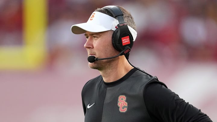 Aug 30, 2025; Los Angeles, California, USA; Southern California Trojans head coach Lincoln Riley watches from the sidelines against the Missouri State Bears in the first half at United Airlines Field at Los Angeles Memorial Coliseum. Mandatory Credit: Kirby Lee-Imagn Images