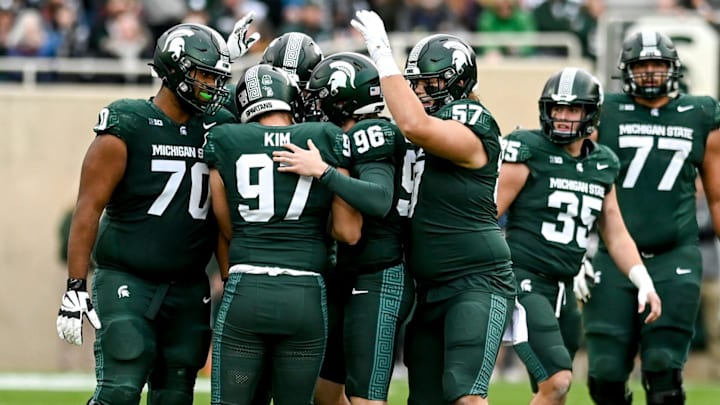 Michigan State's Jonathan Kim celebrates with teammates after kicking a 50-yard field goal against Nebraska during the third quarter on Saturday, Nov. 4, 2023, at Spartan Stadium in East Lansing. Michigan State's Jonathan Kim celebrates with teammates after kicking a 50-yard field goal against Nebraska during the third quarter on Saturday, Nov. 4, 2023, at Spartan Stadium in East Lansing.