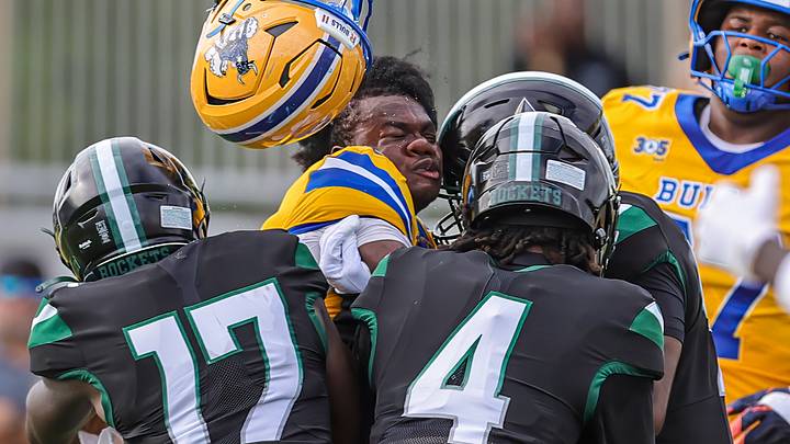 Miami Central defenders bring down a Miami Northwestern ball carrier during a previous meeting between the longtime Miami rivals. Miami Central defenders bring down a Miami Northwestern ball carrier during a previous meeting between the longtime Miami rivals.