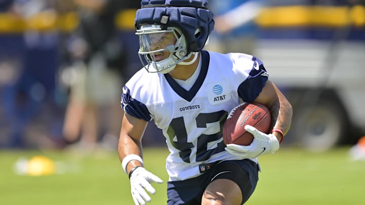 Jul 26, 2023; Oxnard, CA, USA;  Dallas Cowboys running back Deuce Vaughn (42) carries the ball