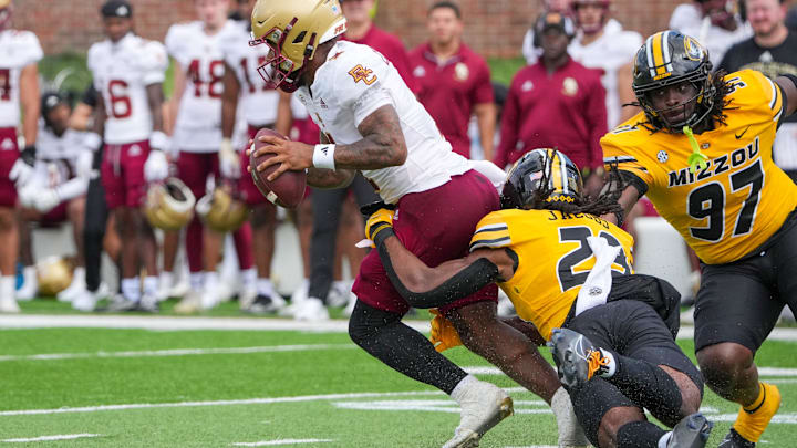 Sep 14, 2024; Columbia, Missouri, USA; Boston College Eagles quarterback Thomas Castellanos (1) is sacked by Missouri Tigers linebacker Khalil Jacobs (29) during the second half at Faurot Field at Memorial Stadium. Mandatory Credit: Denny Medley-Imagn Images Sep 14, 2024; Columbia, Missouri, USA; Boston College Eagles quarterback Thomas Castellanos (1) is sacked by Missouri Tigers linebacker Khalil Jacobs (29) during the second half at Faurot Field at Memorial Stadium. Mandatory Credit: Denny Medley-Imagn Images