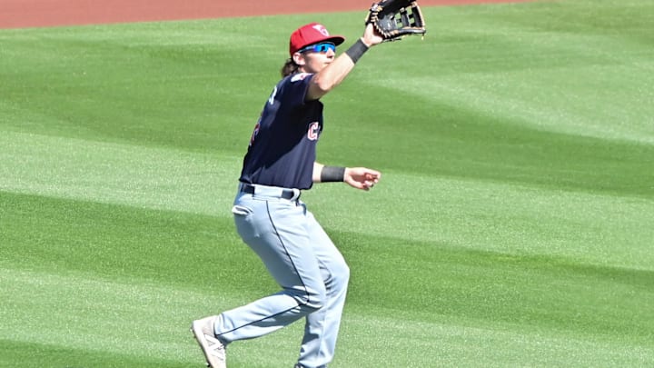 Feb 29, 2024; Tempe, Arizona, USA;  Cleveland Guardians right fielder Chase DeLauter (6) catches a fly ball in the third inning against the Los Angeles Angels during a spring training game at Tempe Diablo Stadium. Mandatory Credit: Matt Kartozian-Imagn Images