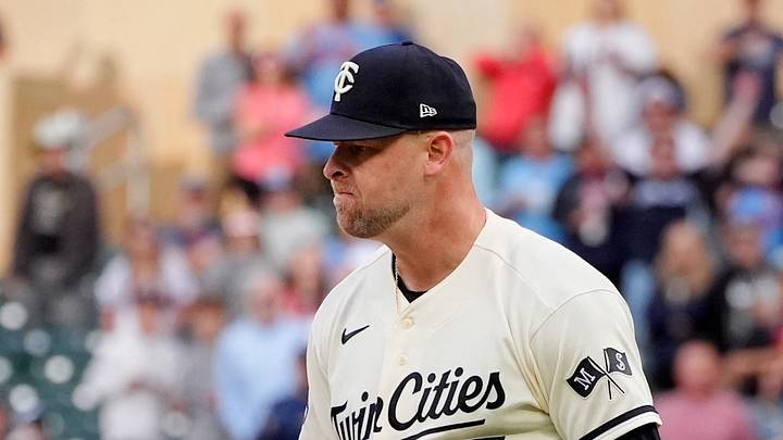 Sep 12, 2026; Minneapolis, Minnesota, USA;  Minnesota Twins relief pitcher A.J. Minter (33) reacts after striking out Cleveland Guardians catcher Austin Hedges (not pictured) to end the game in the ninth inning at Target Field.  Mandatory Credit: Bruce Kluckhohn-Imagn Images