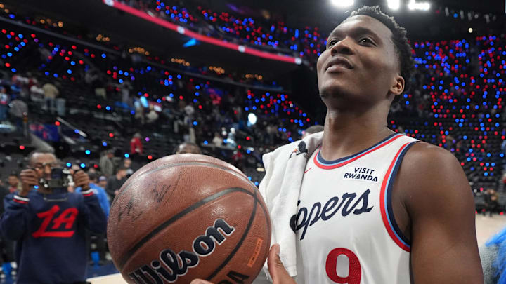 LA Clippers guard Bennedict Mathurin (9) with Clippers mascot Chuck the Condor after the game against the Denver Nuggets at Intuit Dome. LA Clippers guard Bennedict Mathurin (9) with Clippers mascot Chuck the Condor after the game against the Denver Nuggets at Intuit Dome.