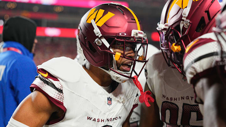 Oct 27, 2025; Kansas City, Missouri, USA; Washington Commanders cornerback Marshon Lattimore (2) celebrates an interception against the Kansas City Chiefs during the first quarter of the game at GEHA Field at Arrowhead Stadium. Mandatory Credit: Jay Biggerstaff-Imagn Images