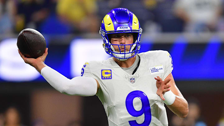 Oct 24, 2024; Inglewood, California, USA; Los Angeles Rams quarterback Matthew Stafford (9) throws against the Minnesota Vikings during the first half at SoFi Stadium. Mandatory Credit: Gary A. Vasquez-Imagn Images