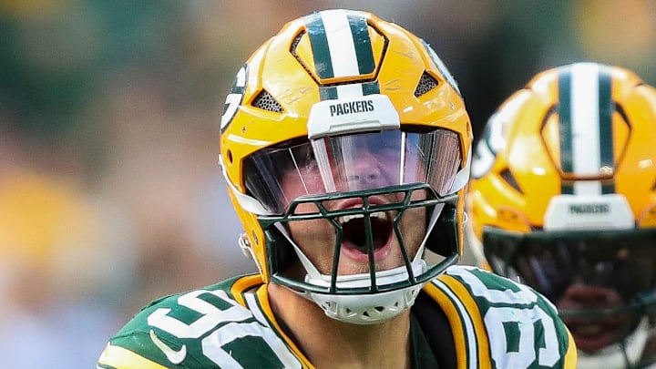 Green Bay Packers defensive end Lukas Van Ness (90) celebrates after sacking Detroit Lions quarterback Jared Goff.